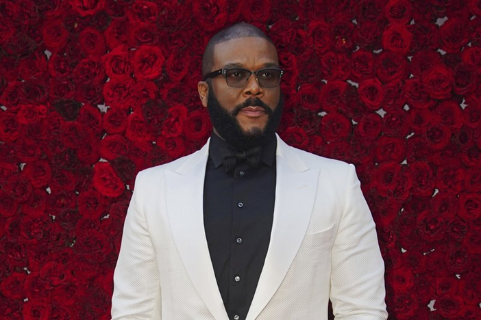 Tyler Perry gave a $21,000 tip while picking up his food order a Houston's on West Paces Ferry Road. 