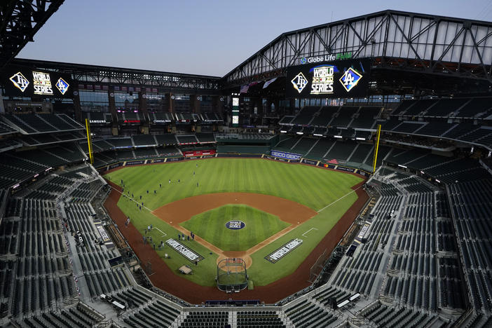 The Tampa Bay Rays practice at Globe Life Field with the roof open as the team prepares for Tuesday's World Series opener against the Los Angeles Dodgers, in Arlington, Texas. First pitch for Game 1 is at 8:09 p.m. ET.