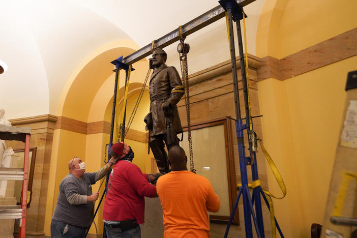 A statue of Robert E. Lee was removed from the U.S. Capitol early Monday.