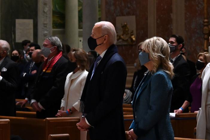 Joe and Jill Biden attend Mass at the Cathedral of St. Matthew the Apostle in Washington, D.C., on Wednesday morning before his inauguration.