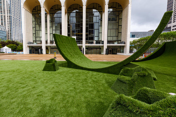 The Lincoln Center campus, presently adorned in a green carpet of synthetic grass, hosts a Juneteenth experience June 19.