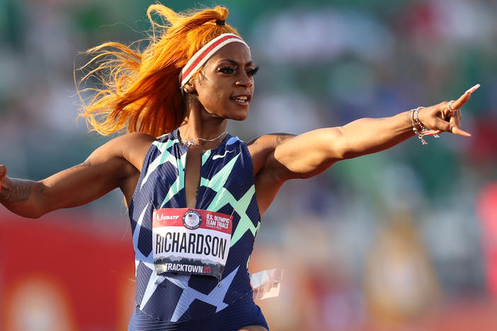 Sha'Carri Richardson celebrates in the 100-meter semifinal last month at the U.S. Olympic track and field team trials in Eugene, Ore. However, a positive drug test disqualified her result at the trials.