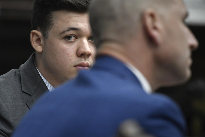 Kyle Rittenhouse listens as Judge Bruce Schroeder talks about how the jury will view video during deliberations in Kyle Rittenhouse's trial at the Kenosha County Courthouse on Wednesday in Kenosha, Wisc.