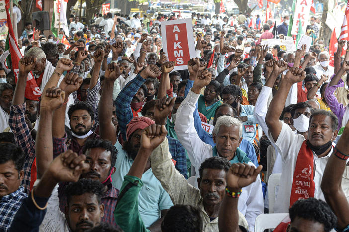 Supporters of All India Kisan Sangharsh Coordination Committee, a group of farmers' organizations, hold flags during a protest to mark one year since the introduction of divisive farm laws and to demand the withdrawal of the Electricity Amendment Bill, in Hyderabad, India, on Thursday.