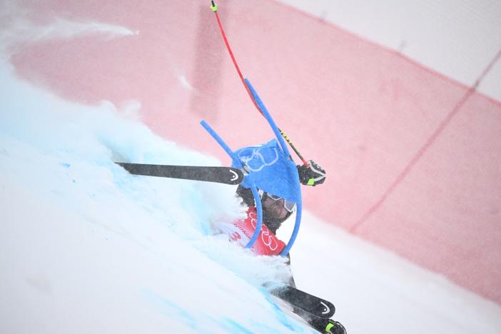 Finland's Samu Torsti falls in the first run of the men's giant slalom on Feb. 13 at the Beijing 2022 Winter Olympic Games.