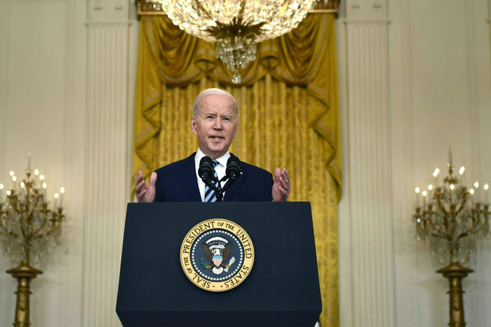 President Biden announces new sanctions against Russia after its invasion of Ukraine in the East Room of the White House on Thursday.