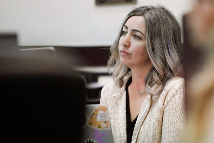 RaDonda Vaught, a former Vanderbilt University Medical Center nurse charged in the death of a patient, listens to opening statements during her trial in Nashville, Tenn., on Tuesday, March 22.