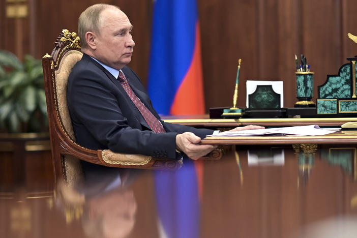 Russian President Vladimir Putin attends a meeting in the Kremlin in Moscow, on Wednesday.