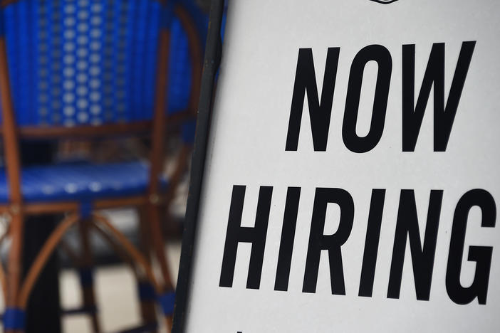 Employers are boosting wages to recruit workers as staffing shortages continue to linger. That's raising the prospect of continued high inflation and aggressive interest rate hikes from the Federal Reserve.