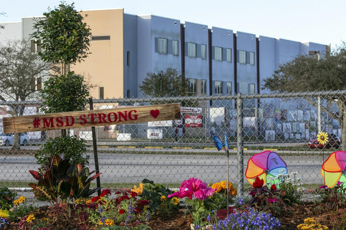 A memorial to the victims is seen outside Marjory Stoneman Douglas High School in Parkland, Fla., on Feb. 14, 2019, during the one-year anniversary of the school shooting.