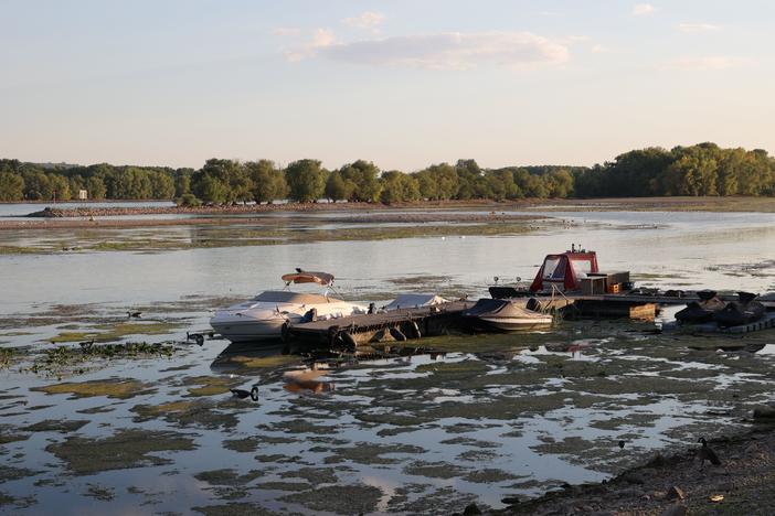 A boat is pictured on the shallow Rhine river near Oestrich Winkel, western Germany, on Aug. 12, as the water level passed below 40 centimeters, making ship transport increasingly difficult.