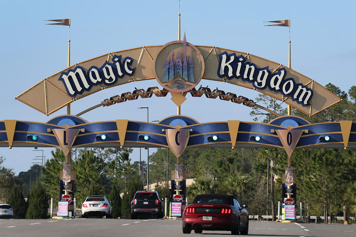 Cars line-up to enter Walt Disney World on February 08, 2023 in Orlando, Florida.