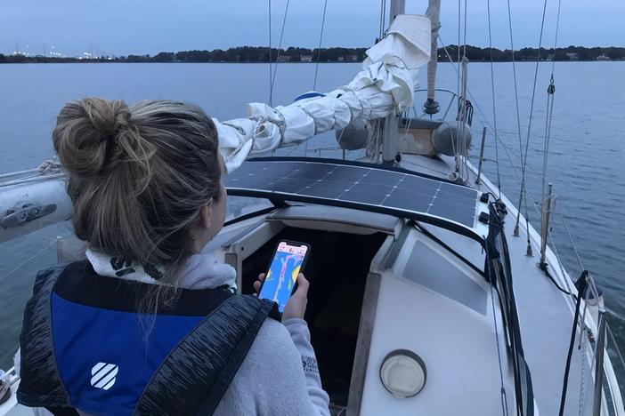 Carrie Kissell spent nearly three months on a sailboat after Airbnb told her she could live and work anywhere. "When the work day was over, I'd close my laptop and you know, go snorkeling," she says.