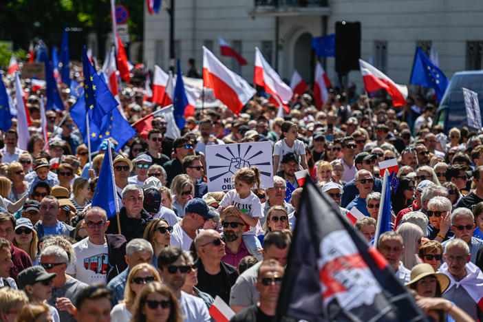 Supporters of Poland's opposition parties hold European Union, Polish flags and banners during a march organized by Civil Platform on June 4, in Warsaw, Poland.