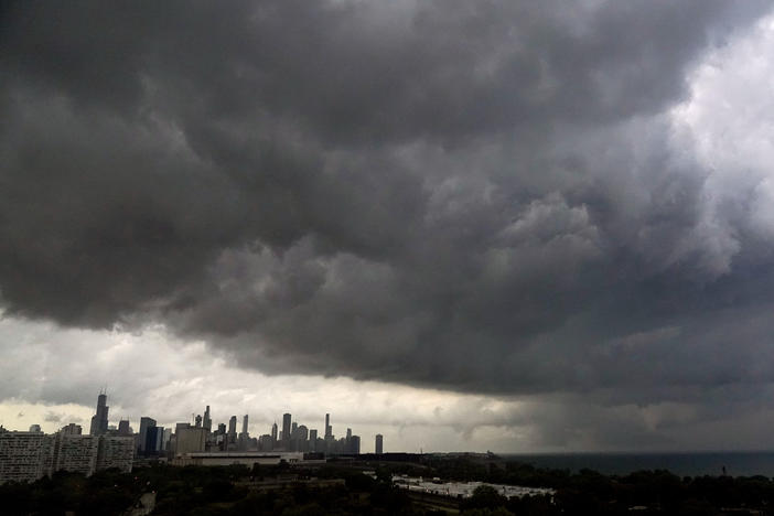 Storm clouds pass over downtown Chicago and the Bronzeville neighborhood of the city heading East out over Lake Michigan as the National Weather Service continued to issue multiple tornado warnings in the greater metropolitan area Wednesday, July 12, 2023.
