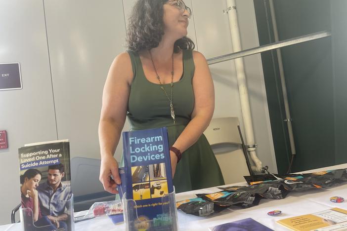 Jess Hegstrom, a public health worker for Lewis and Clark County in Montana, tries to start conversations about suicide risk at gun shows. "I'm not here to waggle my finger at you," she says.