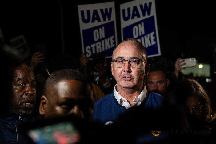 UAW President Shawn Fain makes an appearance with striking workers at the Ford Assembly Plant in Wayne, Mich. on Sept. 15, 2023. The UAW started a strike at three plants of the Big Three in the Midwest. It's the first time the union is striking against the top three Detroit automakers at once.