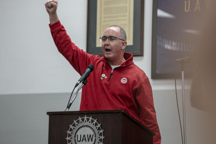 UAW President Shawn Fain joins union members at a rally at the UAW Local 551 hall on the South Side in Chicago on Oct. 7, 2023. Fain said on Friday the union will now be ready to expand its strike at any time, calling it a "new phase" in its fight against the Big Three automakers.