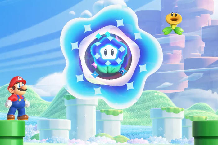 Mario and a Talking Flower contemplate the Wonder Flower that will soon rock their world.
