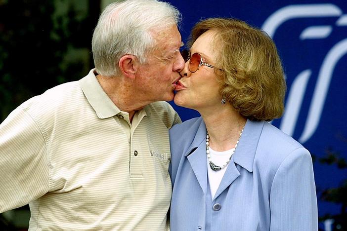 Former U.S. president Jimmy Carter receives a kiss from his wife Rosalynn Carter after a press conference in Plains, Ga., in Oct. 2002.