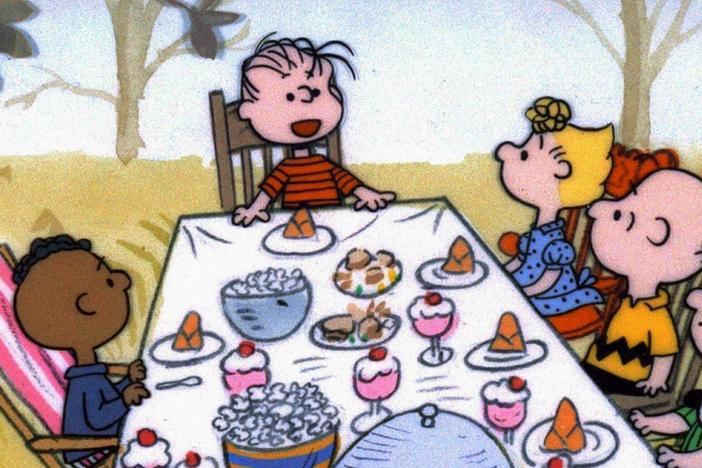 The <em>Peanuts</em> gang celebrates Thanksgiving, but why is Franklin by himself on one side of the table?