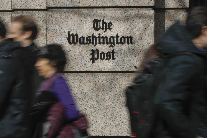 More than 750 <em>Washington Post</em> workers have agreed to walk off the job on Thursday to protest stalled contract negotiations. The company has warned of layoffs if too few staffers take voluntary buyouts.