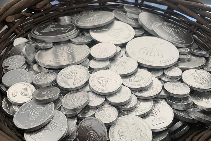 Gelt are chocolate coins traditionally given out during Hanukkah. NuRoots, the Jewish Federation of Greater Los Angeles' young adult initiative, has baskets of gelt to hand out at its events.