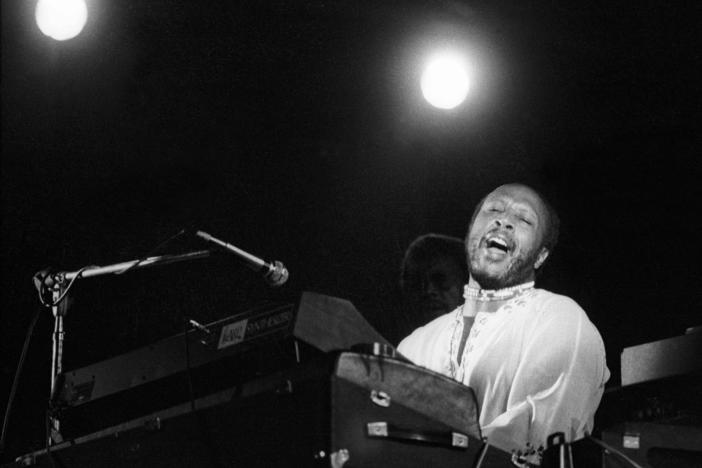 Les McCann performs at the Newport Jazz Festival in 1974.