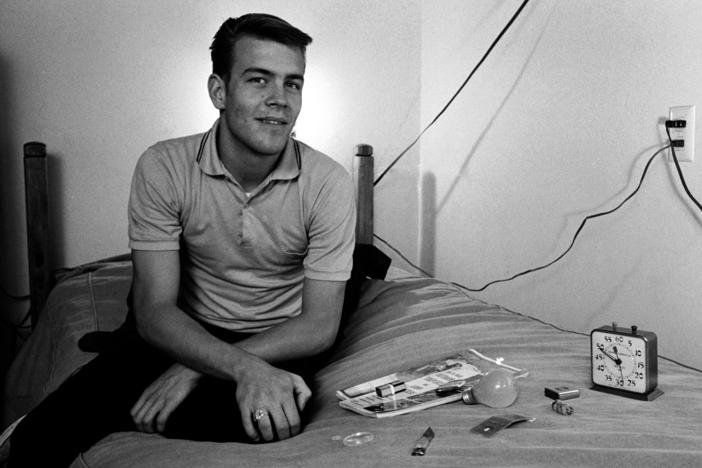 In January 1964, American student Randy Gardner sits on a bed next to various household objects he will later have to identify by memory as part of a sleep deprivation experiment in San Diego, Calif. Gardner set the world record during the experiment, staying awake for over 264 hours.