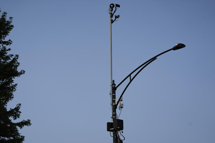 ShotSpotter equipment overlooks the intersection of South Stony Island Avenue and East 63rd Street in Chicago on Aug. 10, 2021. The city will not renew its contract for the gunfire detection equipment.