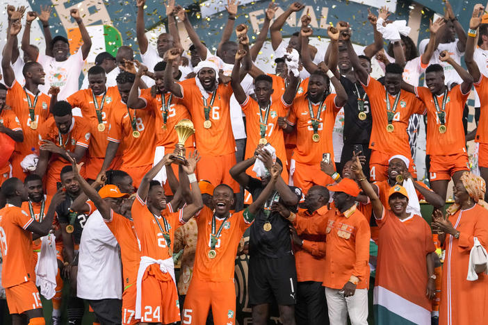 Cote D'Ivoire players celebrate after winning the African Cup of Nations final soccer match between Nigeria and Cote D'Ivoire, at the Olympic Stadium of Ebimpe in Abidjan, Ivory Coast, Sunday, Feb. 11