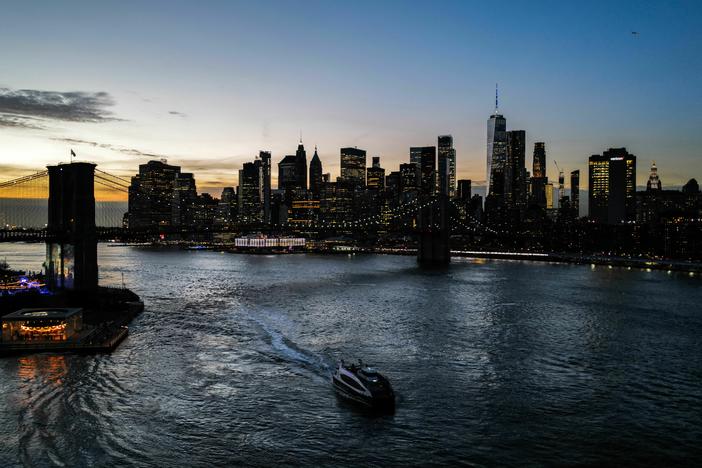 An outpost of The Second City has opened in Brooklyn. Above, the Brooklyn Bridge and lower Manhattan skyline are pictured at sunset.