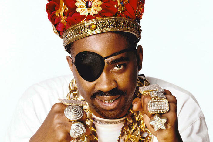 Slick Rick is known for his eyepatch and the crowns he often wears.