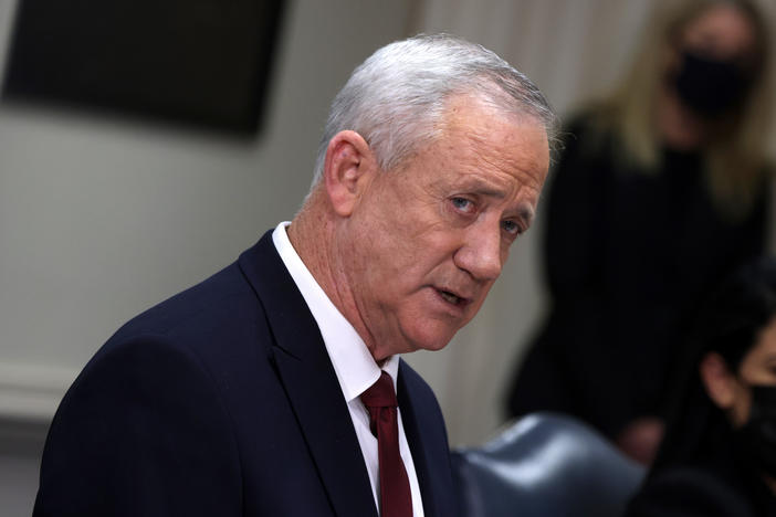 Benny Gantz speaks at the Pentagon in December 2021 in Arlington, Va. Gantz, a former army chief and current minister in Israel's three-member war cabinet, said he would quit the government in three weeks if Prime Minister Benjamin Netanyahu does not advance a plan to replace Hamas in Gaza.