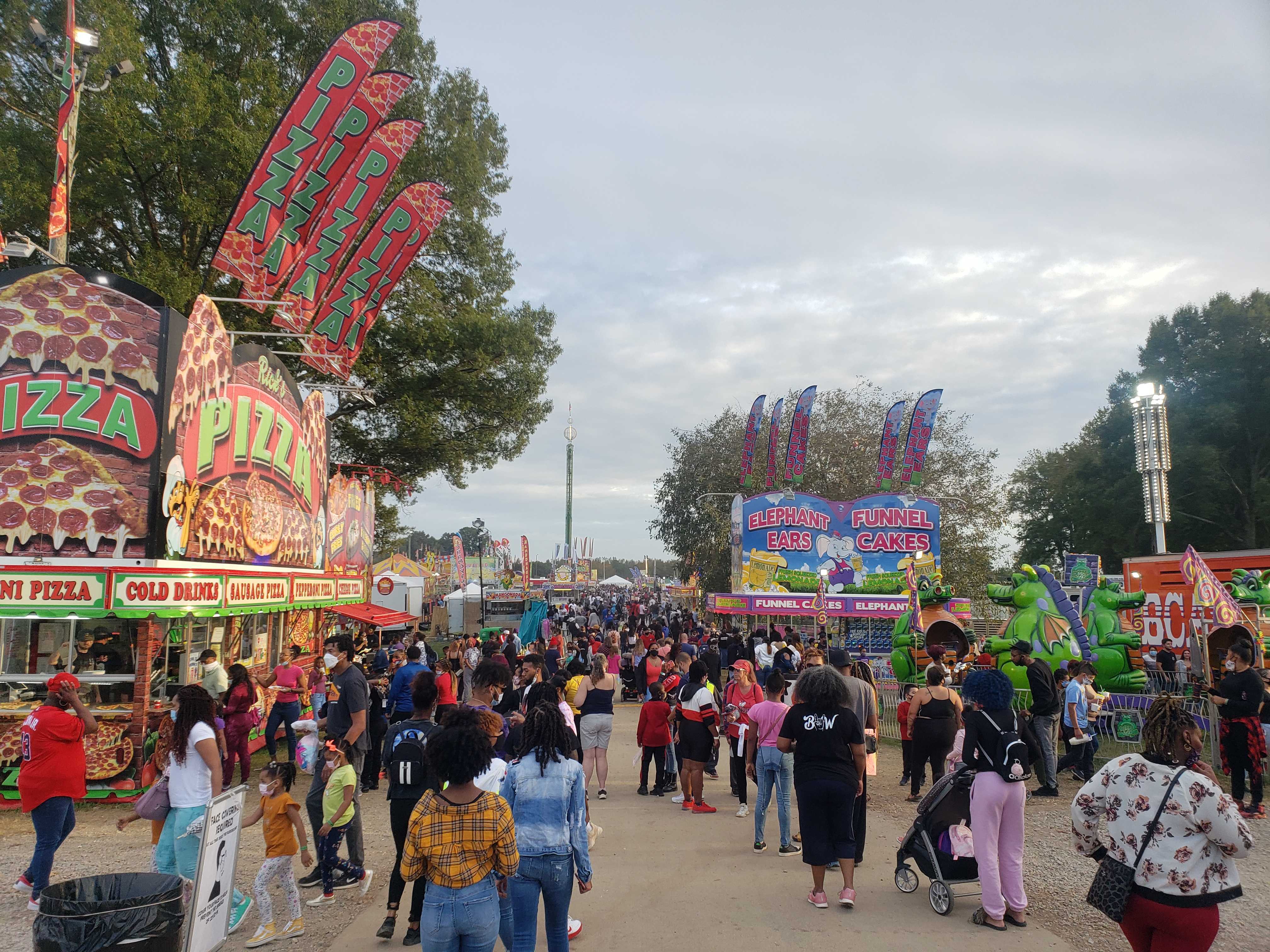 Braving Pandemic, Hundreds Drawn To State Fair For Bit of Normalcy