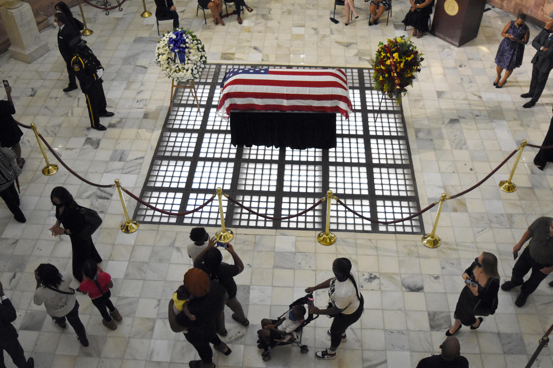 Mourners pass through the Georgia State Capitol to pay respects to Rep. John Lewis.