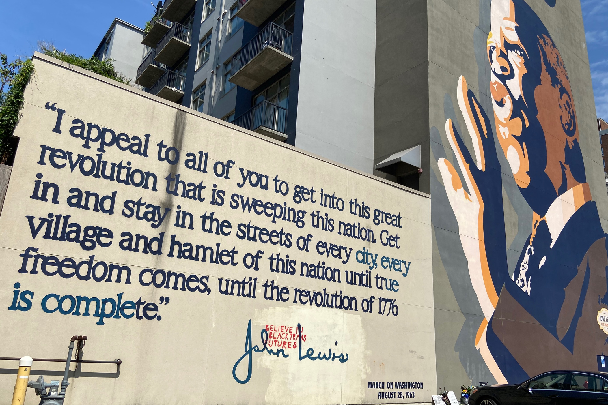 A mural of the late Congressman John Lewis in Atlanta.