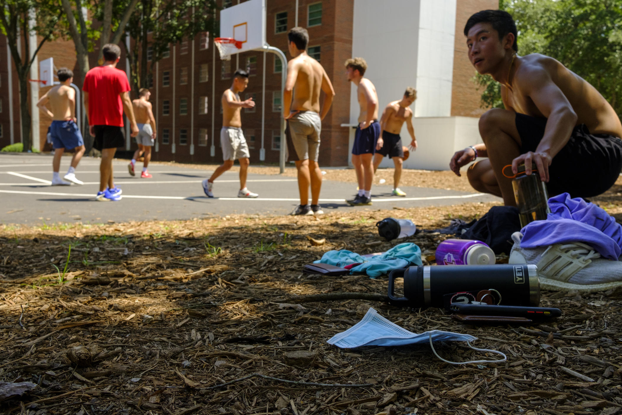 A group of University of Georgia freshmen play basketball behind the high rise dormitories on Baxter Street Tuesday. 