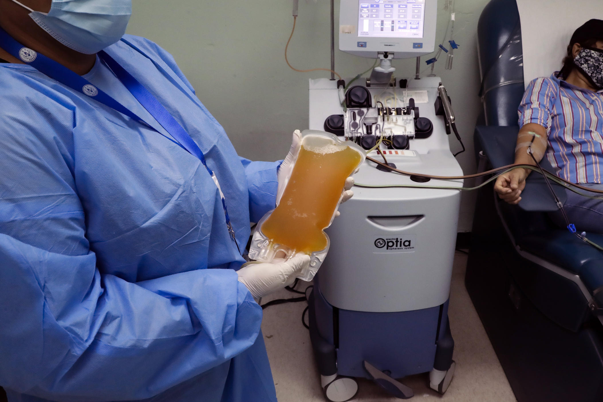 A recovered COVID-19 patient donates blood at the Arnulfo Arias Madrid Hospital, in Panama City, Wednesday, May 13, 2020. 