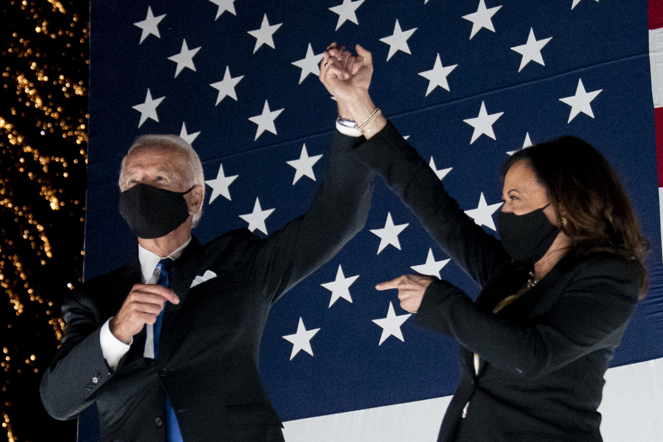 Democratic presidential candidate former Vice President Joe Biden and his running mate Sen. Kamala Harris, D-Calif., watch fireworks during the fourth day of the Democratic National Convention, Thursday, Aug. 20, 2020, at the Chase Center in Wilmington, Del. 