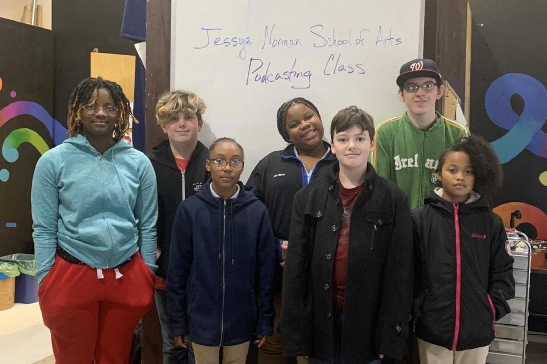 Students from the Jessye Norman School of the Arts, who are reporting for the podcast (l to r): Essence Willingham, Atticus Dillard-Wright, Kaleisha Sullivan, Jalia Burns, Aiden Allen, Thomas Collins, and Gabbie Stallings.