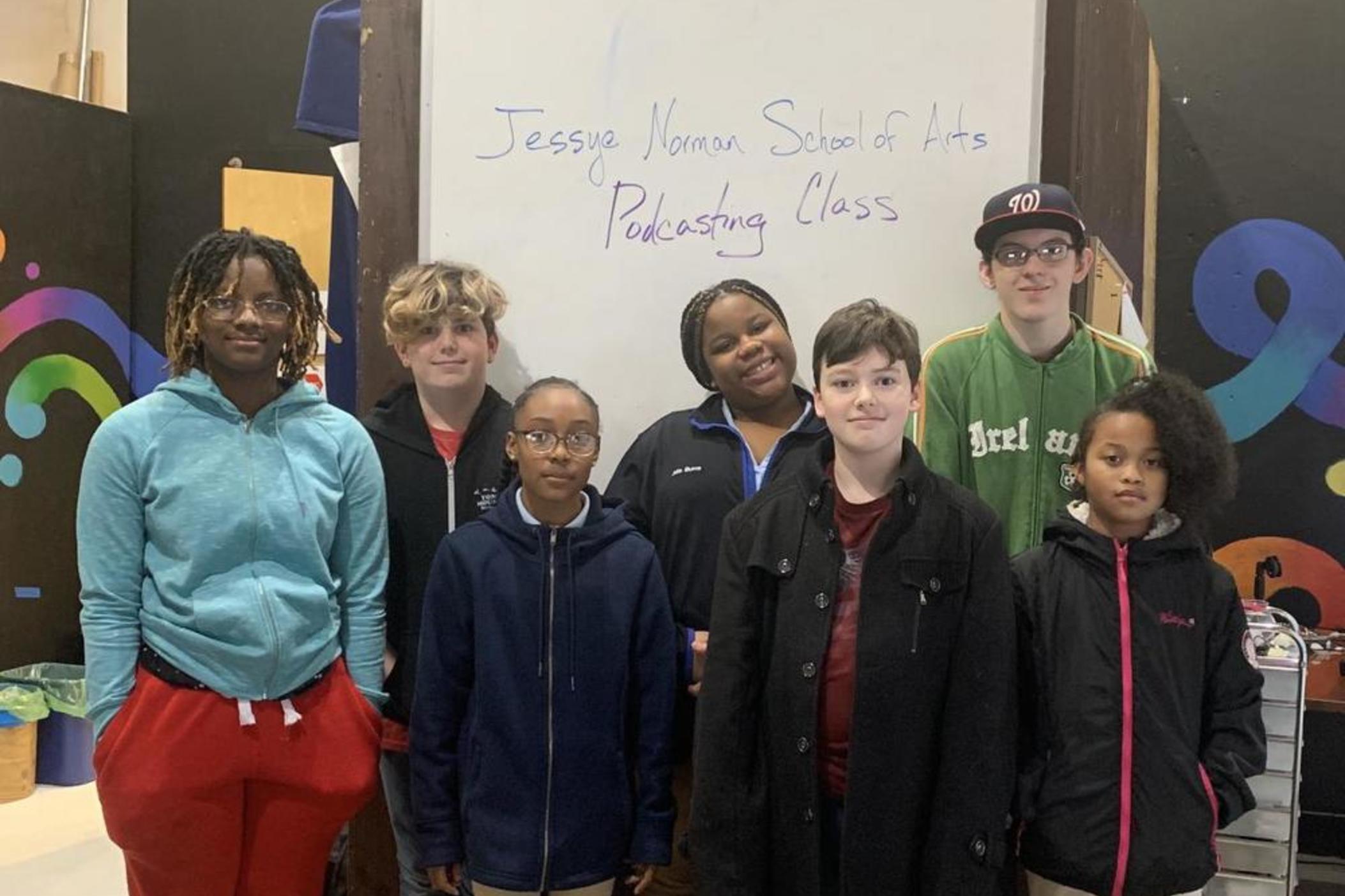 Students from the Jessye Norman School of the Arts, who are reporting for the podcast (l to r): Essence Willingham, Atticus Dillard-Wright, Kaleisha Sullivan, Jalia Burns, Aiden Allen, Thomas Collins, and Gabbie Stallings.