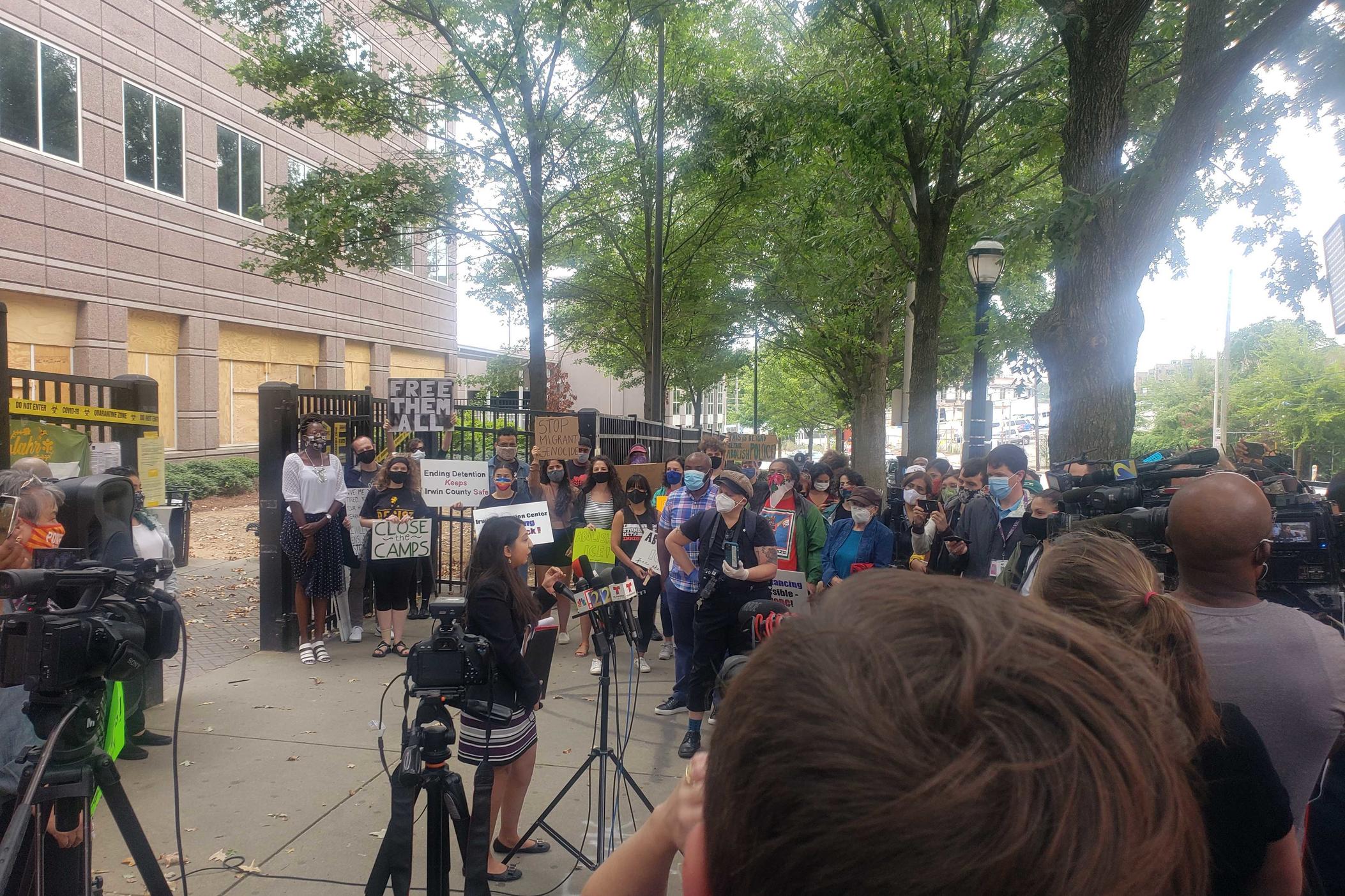 Protesters gather outside of the ICE field office in Atlanta on Tuesday morning.