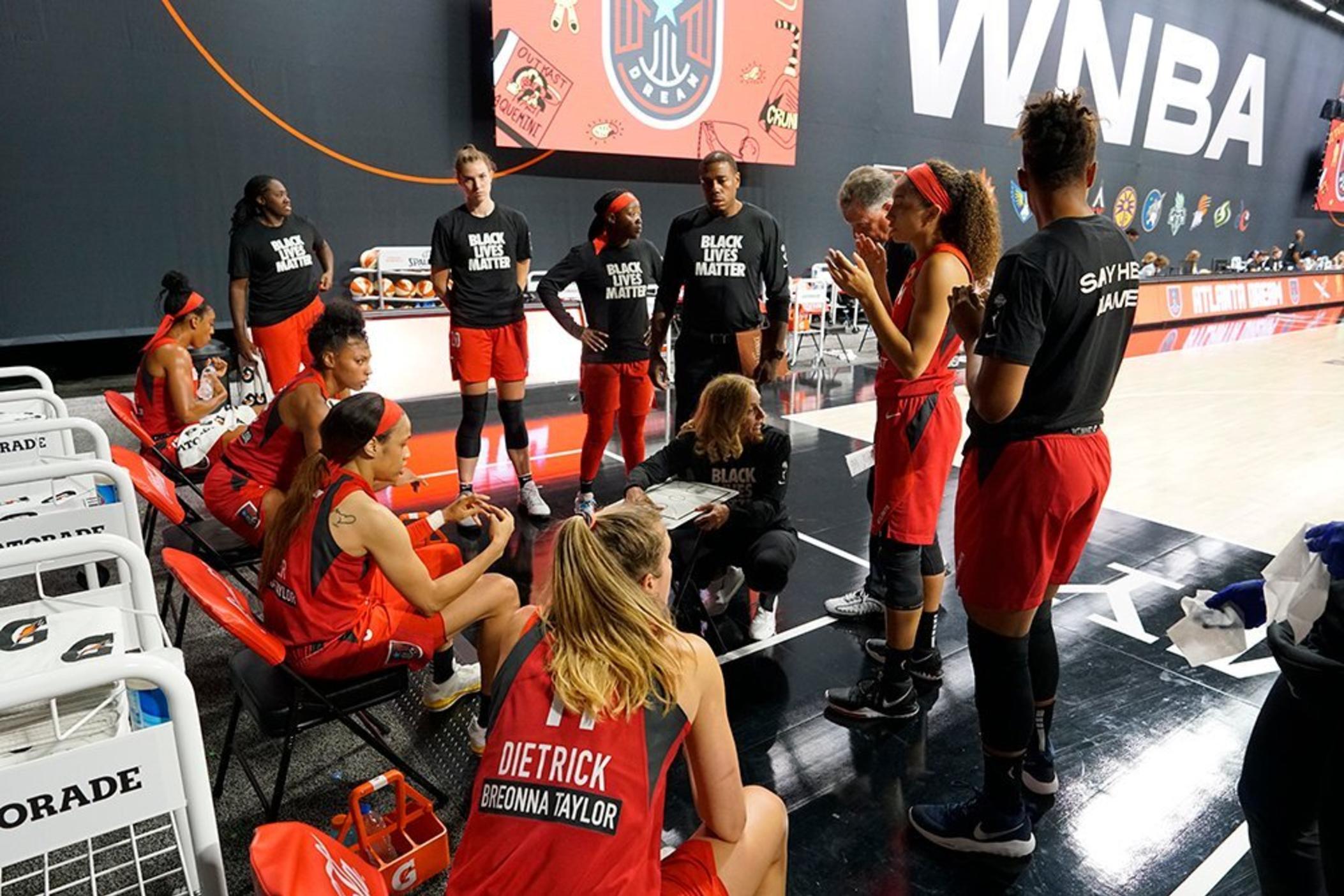 Members of the WNBA's Atlanta Dream wear clothing in solidarity with Black Lives Matter.