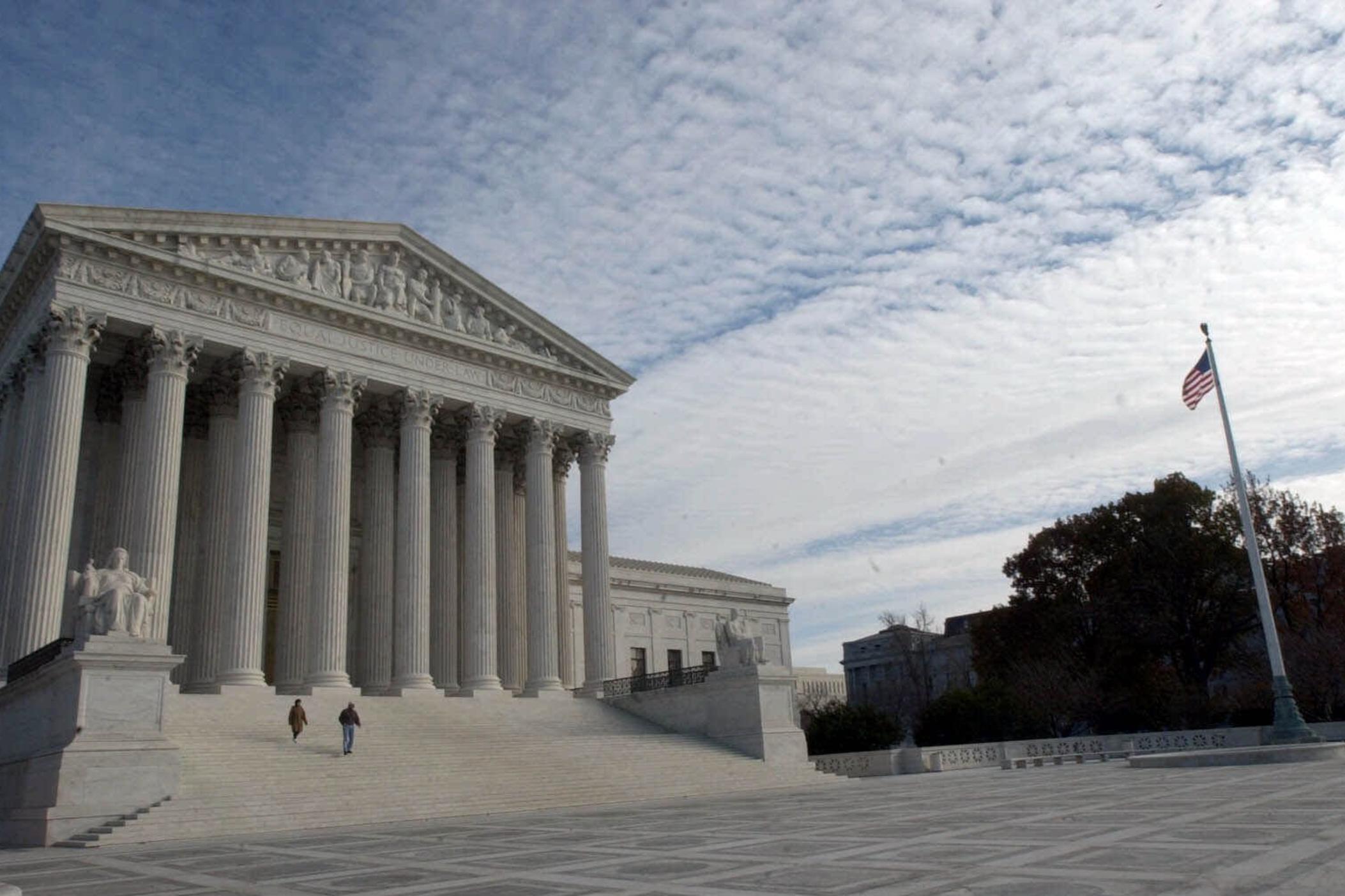 The Bush campaign has asked the U.S. Supreme Court, shown on Thursday, Nov. 23, 2000, to overturn the Florida Supreme Court ruling on the recounting of ballots. (AP Photo/Stephen J. Boitano)