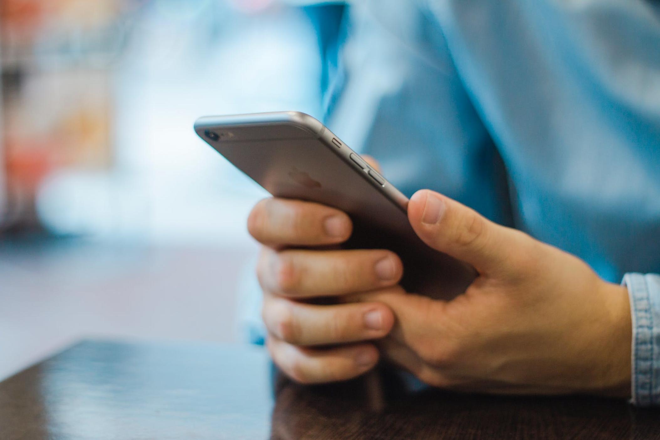 Person holding cell phone