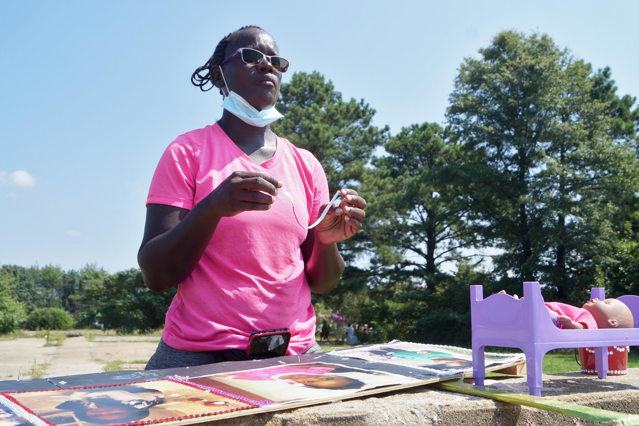 Georgetta Morton creates art for the Secoriea Turner Memorial Garden.