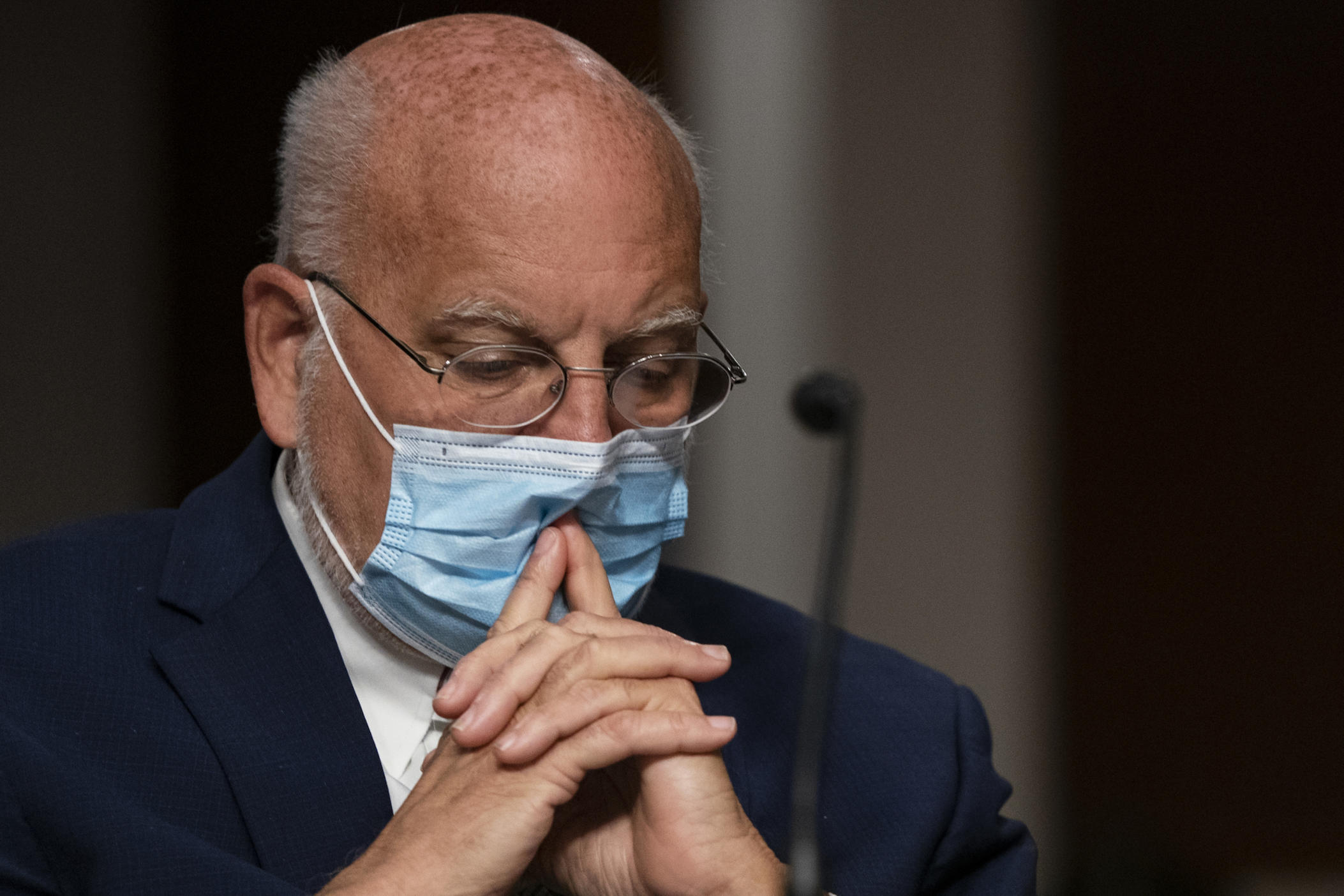 Dr. Robert Redfield, director of the Centers for Disease Control and Prevention, listens during a Senate Senate Health, Education, Labor, and Pensions Committee Hearing on the federal government response to COVID-19 Capitol Hill on Wednesday, Sept. 23, 2020, in Washington. (Alex Edelman/Pool via AP)