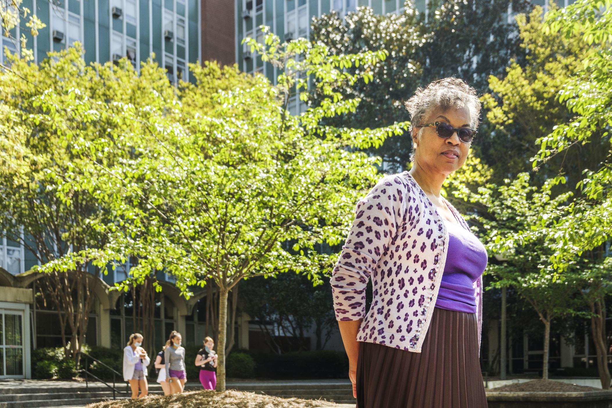 Hattie Thomas Whitehead in the courtyard of Creswell Hall on the University of Georgia campus, mere feet from where the shotgun house she was raised in once stood. Thomas Whitehead and others with connections to the Athens neighborhood of Linnentown have won a kind of reparations for the neighborhood's erasure. 