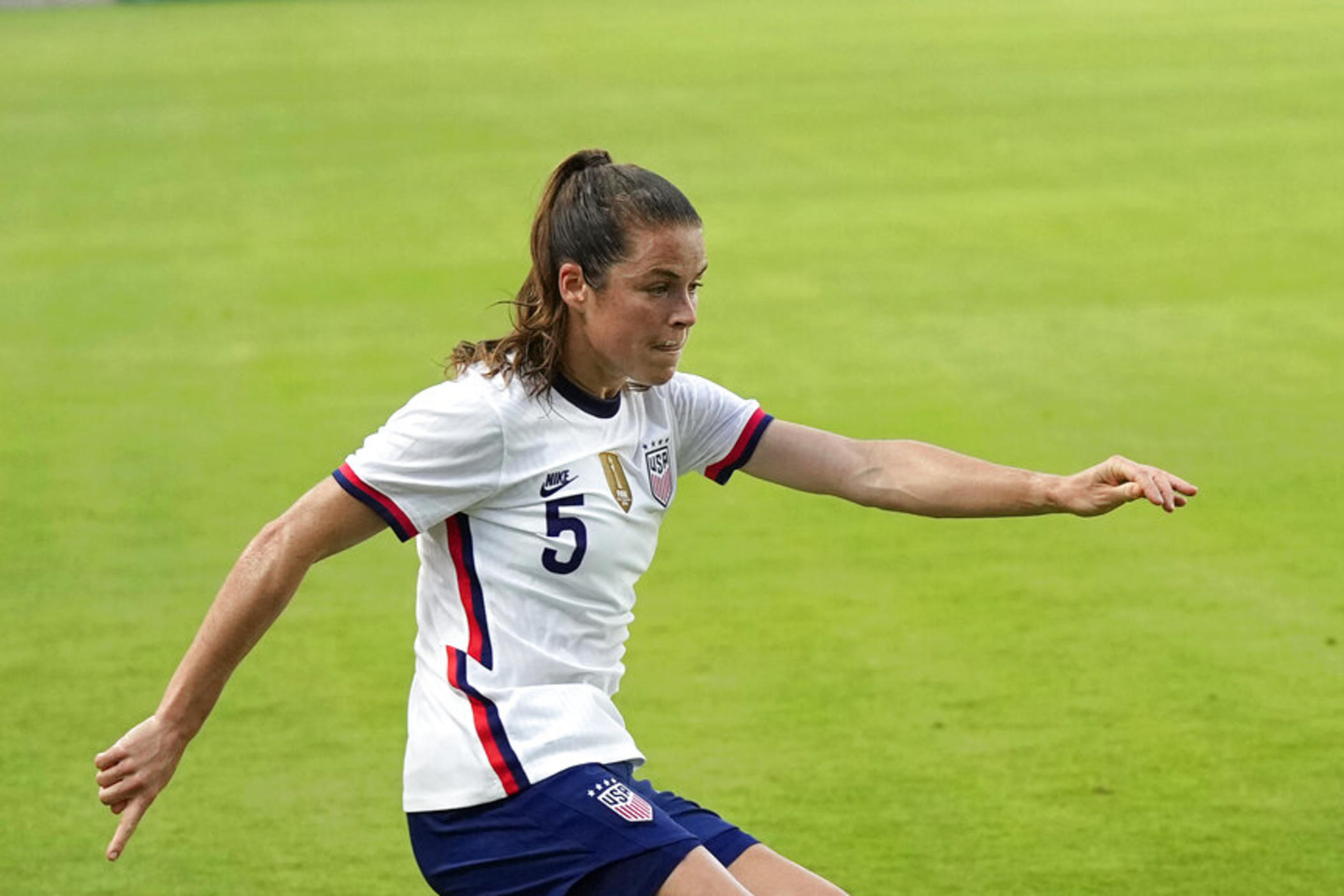 Kelley O'Hara (5) advances the ball during the first half of an international friendly soccer match against Portugal Thursday, June 10, 2021, in Houston. (AP Photo/David J. Phillip)